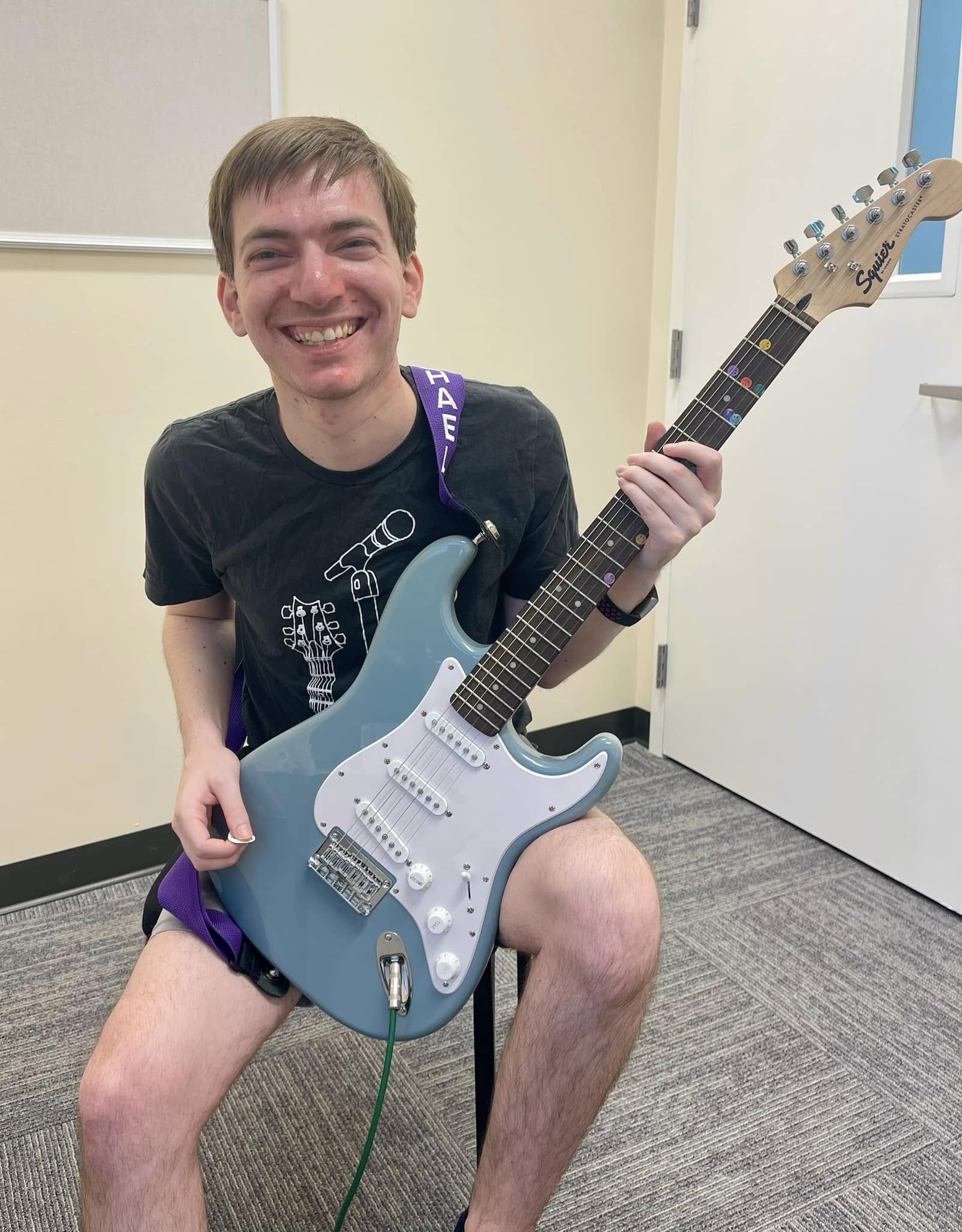 Michael with his electric guitar