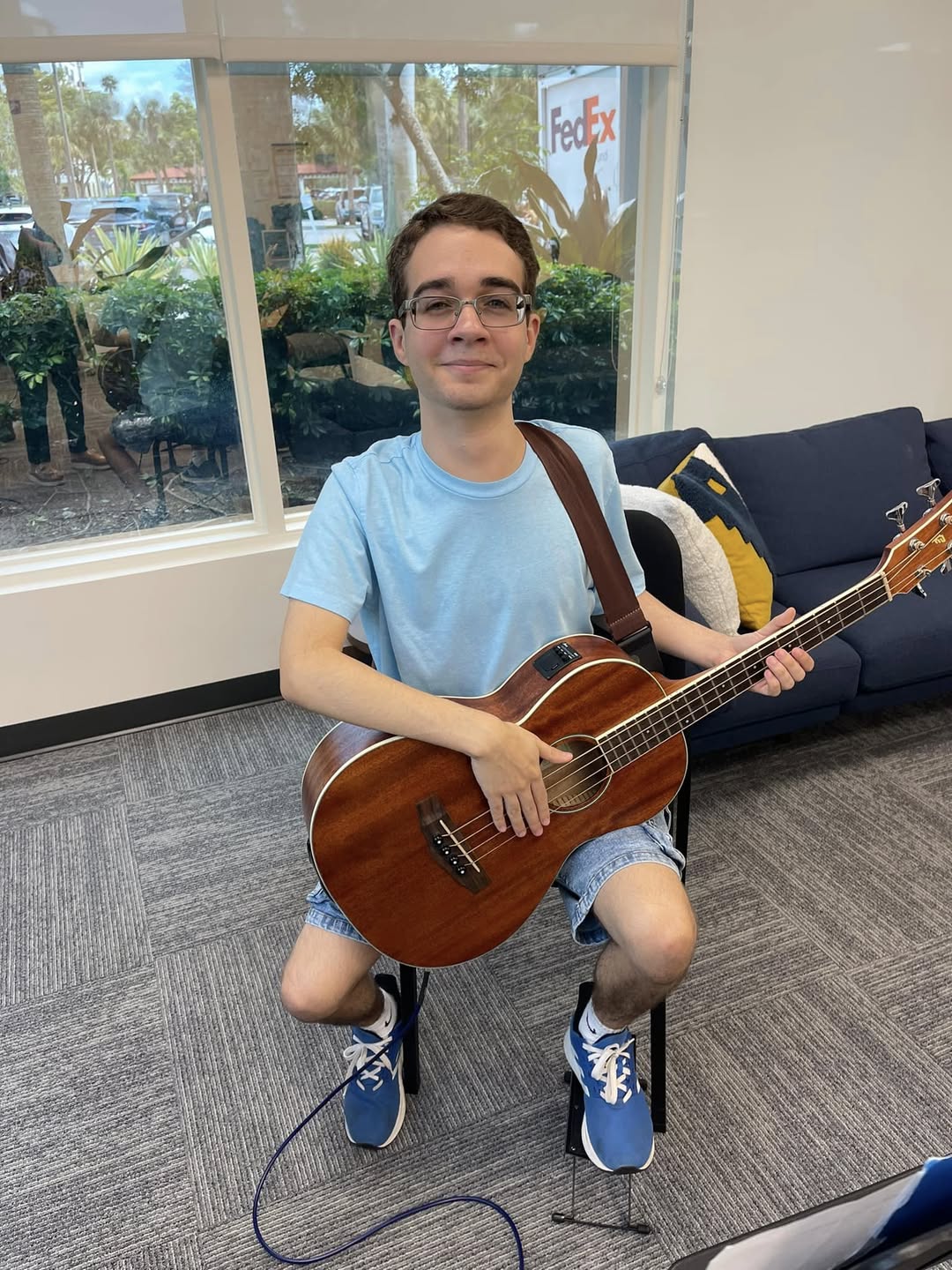 Student playing the ukulele
